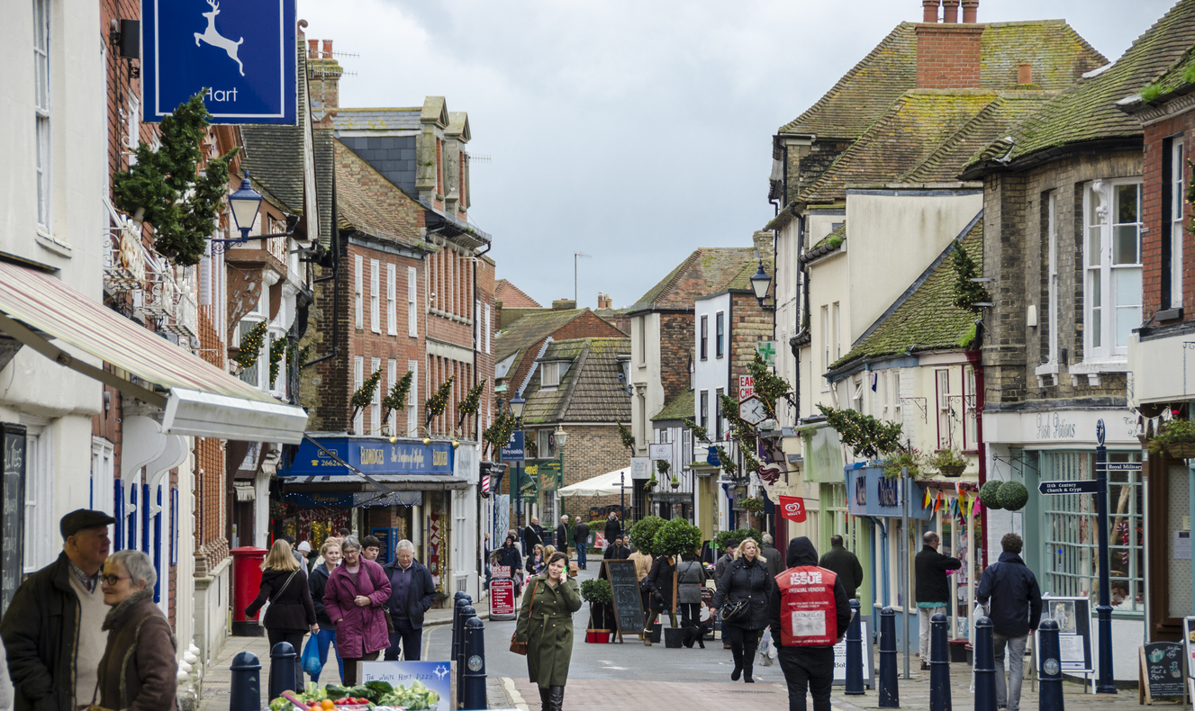 Shoppers in the bustling High Street, Hythe, Kent, UK