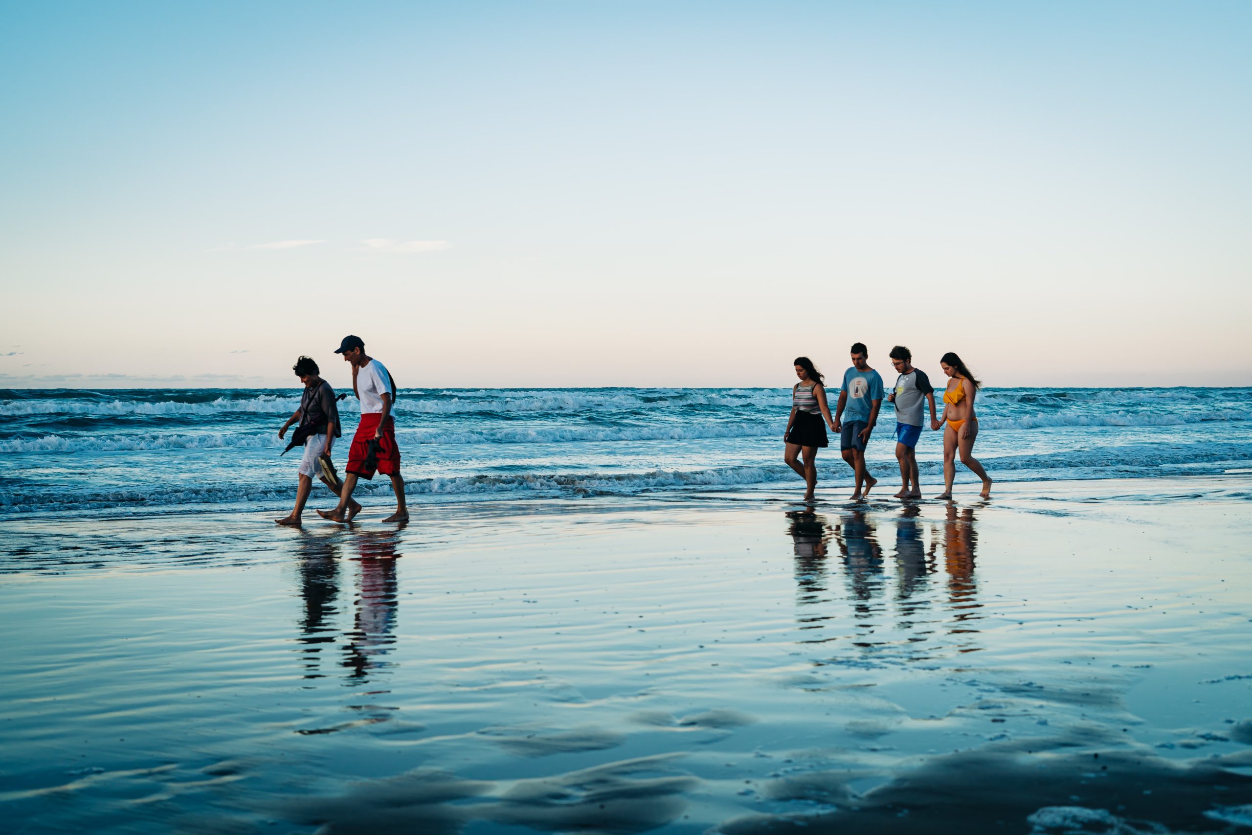 Six people on the beach